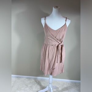 Everly cross over tie dress in a dusty pink linen great for easter or wedding